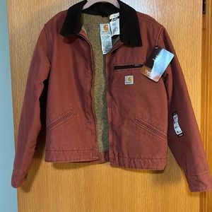 Women’s size medium, Carhartt coat, rust colored